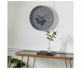 Round Black And Grey Metal Wall Clock With Functioning Gear Center